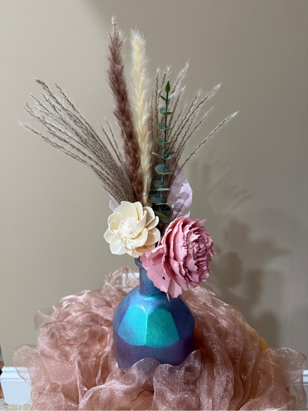 Color shifting Blue Decorative Vase with Pink and Cream Wood and dried flowers